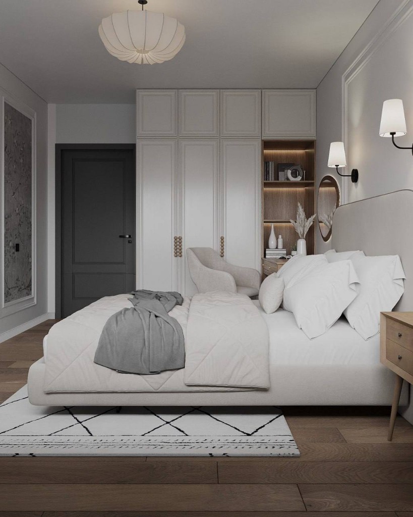 Спальня с кроватью и рабочим местом у окна