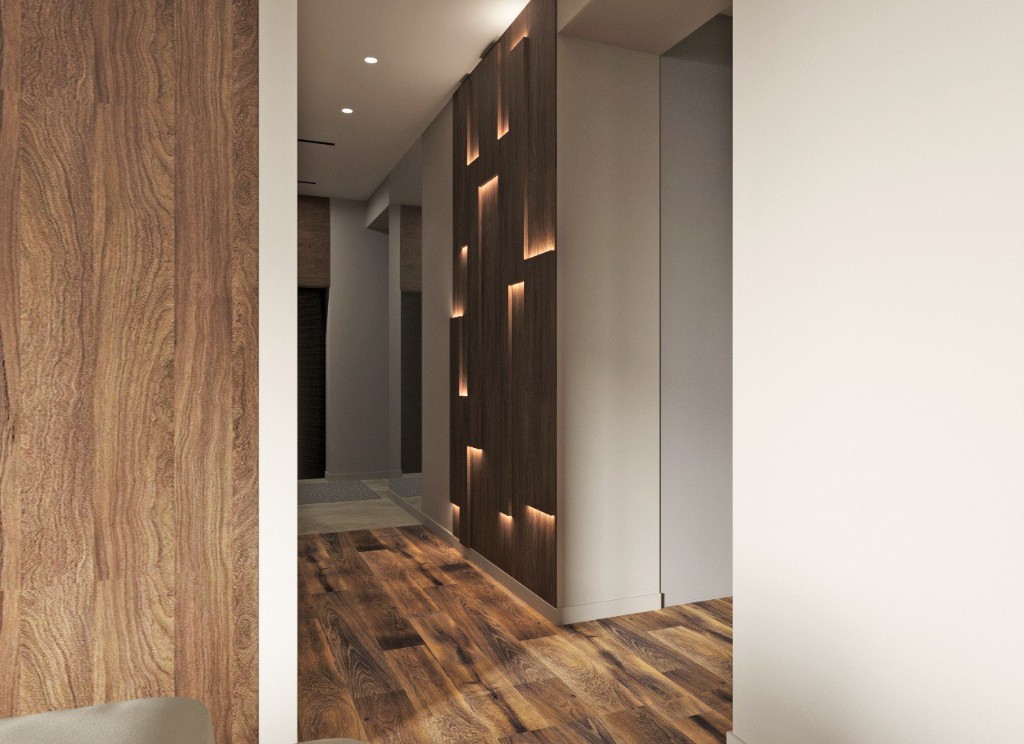 Прихожая со встроенными шкафами и деревянной дверью